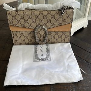 Leather bag with silver hardware